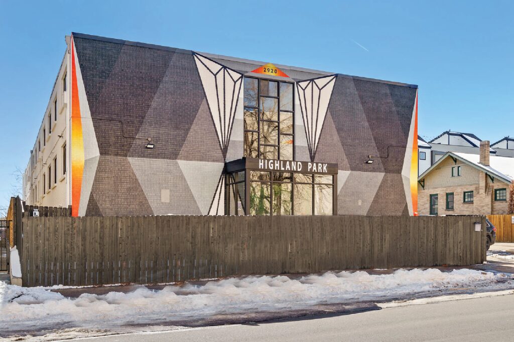 Exterior view of Highland Park building with geometric pattern paint design.